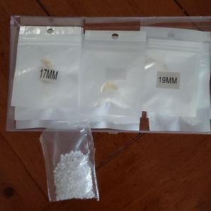 Set of 11 Vampire Fangs with plastic adhesive bead